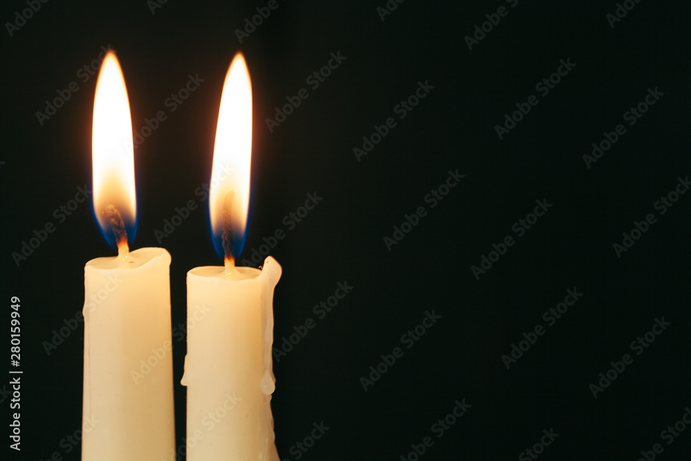 Candle flame close up on a black background Candle flame close up on a black background