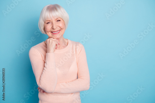 Portrait of her she nice-looking attractive lovely kind well-groomed cheerful cheery glad content gray-haired lady enjoying healthy life isolated on bright vivid shine blue green turquoise background photo