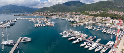 Aerial view of Porto Montenegro. Yachts in the sea port of Tivat city. Kotor bay, Adriatic sea. Famous travel destination.