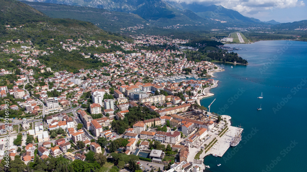 Aerial view of Porto Montenegro. Yachts in the sea port of Tivat city. Kotor bay, Adriatic sea. Famous travel destination.