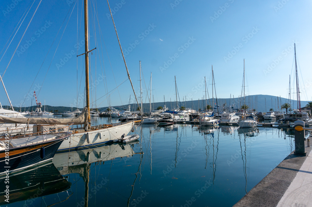 Porto Montenegro. Yachts in the sea port of Tivat city. Kotor bay, Adriatic sea. Famous travel destination.