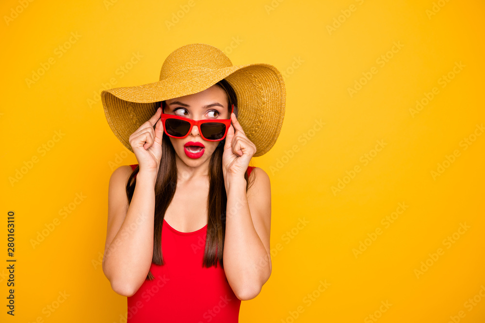 Photo of amazing lady nice look came seaside trip voyage listen hotel neighbors fight sly person wear specs sun hat red swimming suit isolated yellow background - obrazy, fototapety, plakaty 
