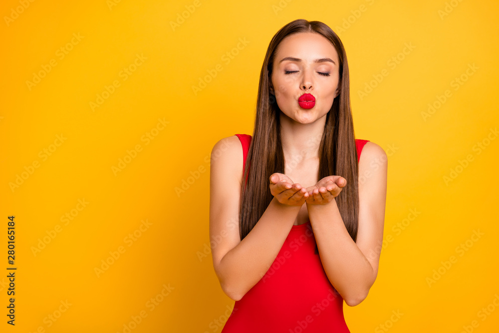 Naklejka premium Portrait of her she nice-looking attractive lovely lovable winsome charming sweet tender posh straight-haired lady sending kiss closed eyes isolated over bright vivid shine yellow background