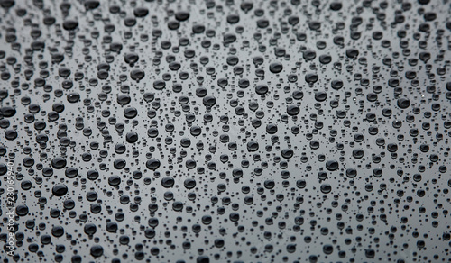 Raindrops on the black surface
