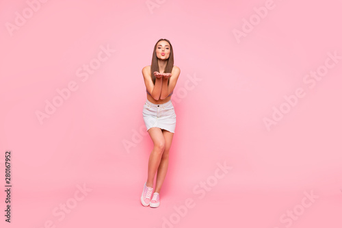 Fototapeta Naklejka Na Ścianę i Meble -  Full size photo of pretty lady sending air kisses try attract boys isolated over pink background