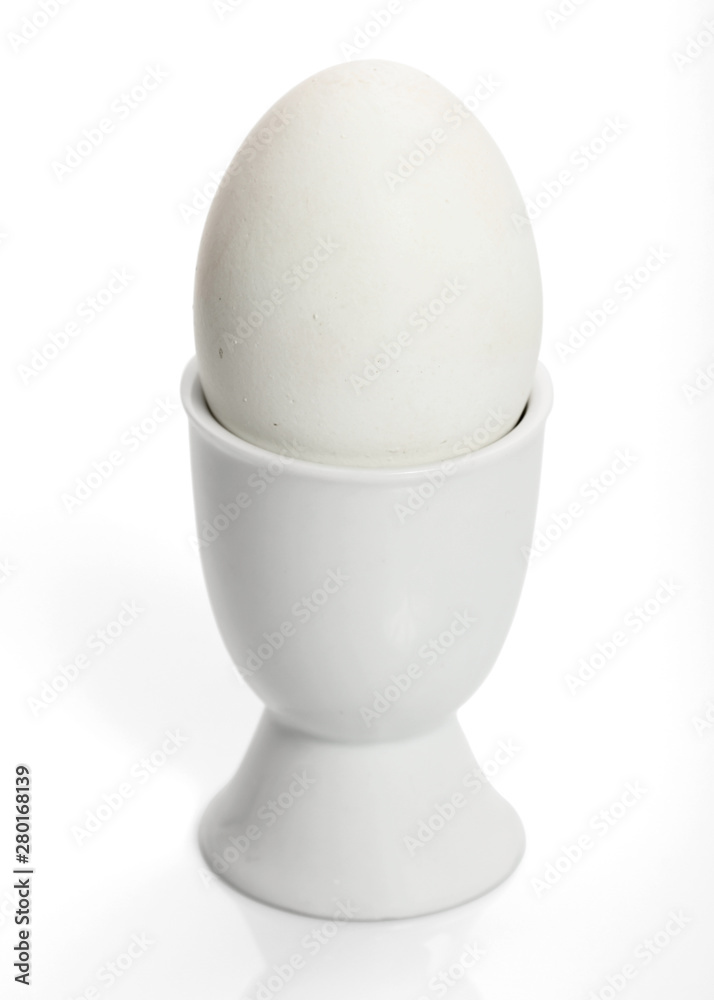 egg in cup isolated on white