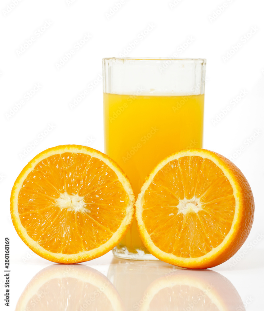 glass of juice with slice of orange glass of juice with slice of orange