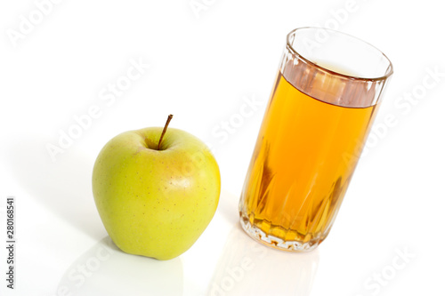 glass of apple juice and apples isolated on white