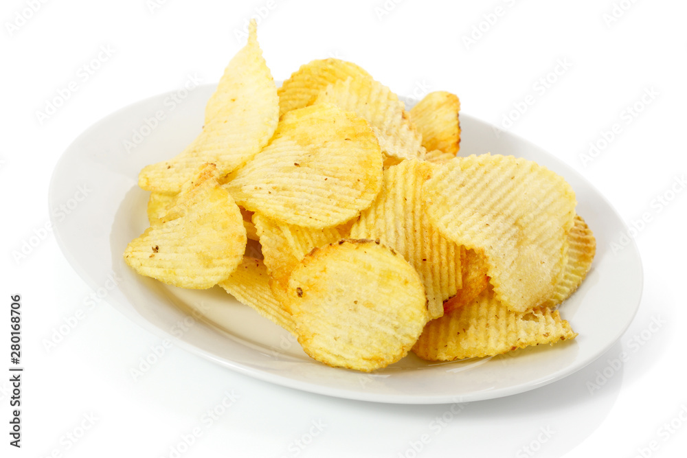 potato chips on a plate isolated on white background potato chips on a plate isolated on white background