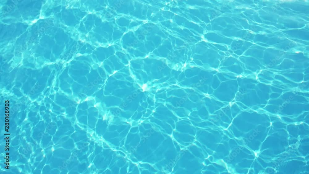 Inspiring celeste wading pool waters with sparkling sunny beams in slow motion Inspiring celeste wading pool waters with sparkling sunny beams in slow motion
