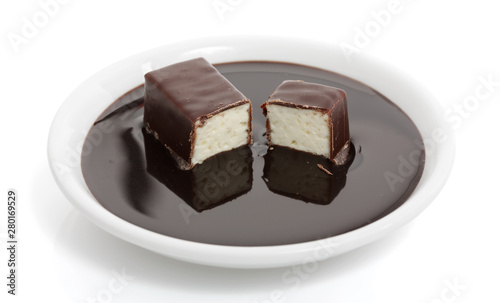 soft chocolate-covered candy filled with milk souffle