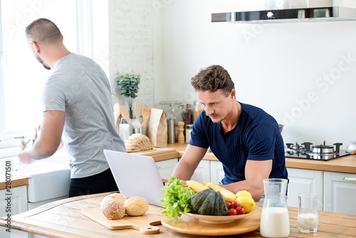 Gay couple spending morning time together photo