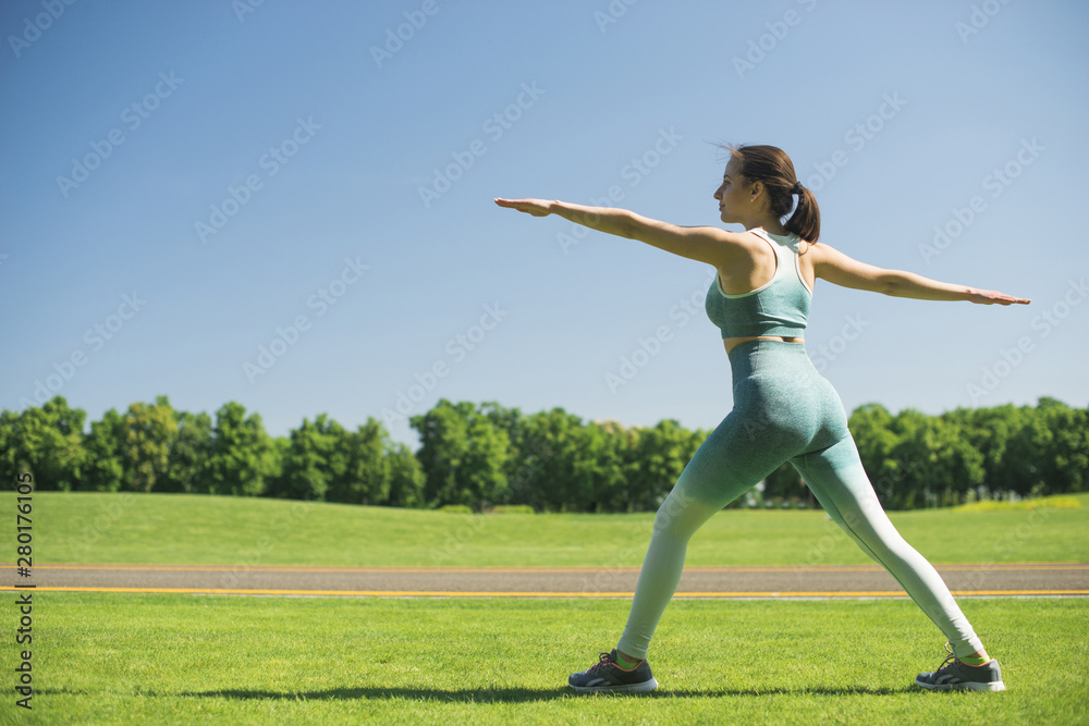 Athletic woman practicing yoga outdoor Athletic woman practicing yoga outdoor