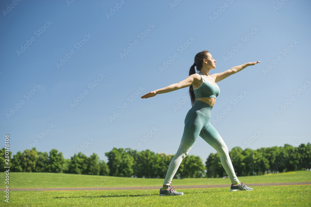 Athletic woman practicing yoga outdoor Athletic woman practicing yoga outdoor