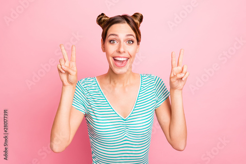 Close-up portrait of her she nice-looking lovely girlish charming cute pretty cheerful cheery girl showing double v-sign isolated over pink pastel background