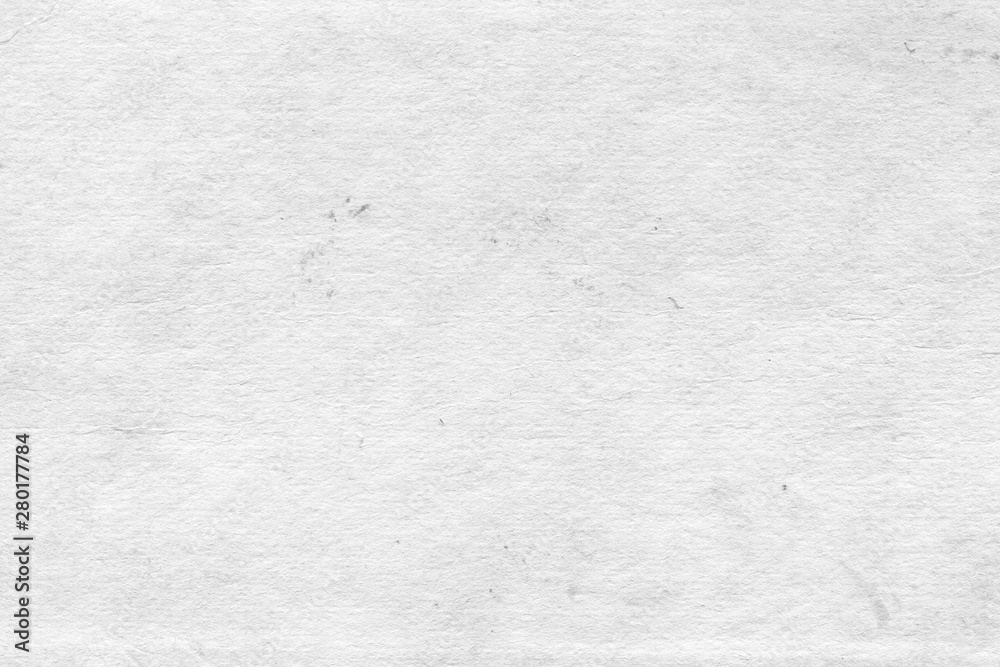 Obraz premium Vintage and old looking paper background. Retro cardboard texture. Grunge paper for drawing. Ancient book page.