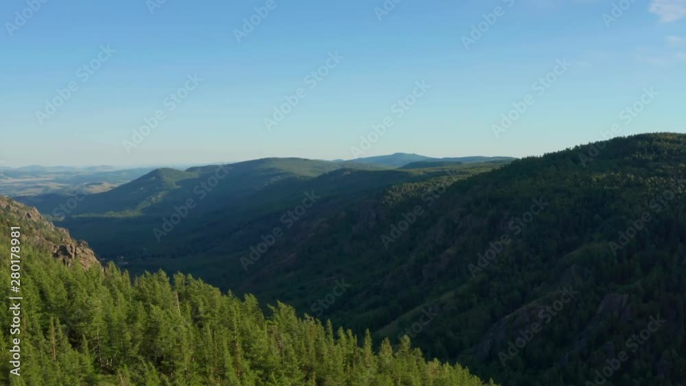 The never ending crane shot over the area. Beautiful landscape of mountainous terrain. Magic hours evening. The never ending crane shot over the area. Beautiful landscape of mountainous terrain. Magic hours evening.