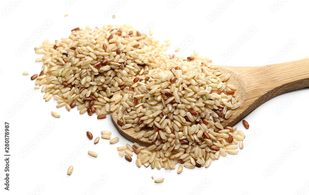 Integral rice pile with wooden spoon isolated on white background Integral rice pile with wooden spoon isolated on white background