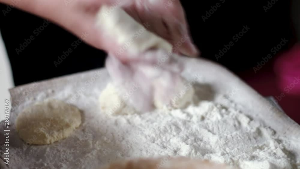 Rolling and Shaping Raw Cheese Pancakes with Hands. Rolling and Shaping Raw Cheese Pancakes with Hands.