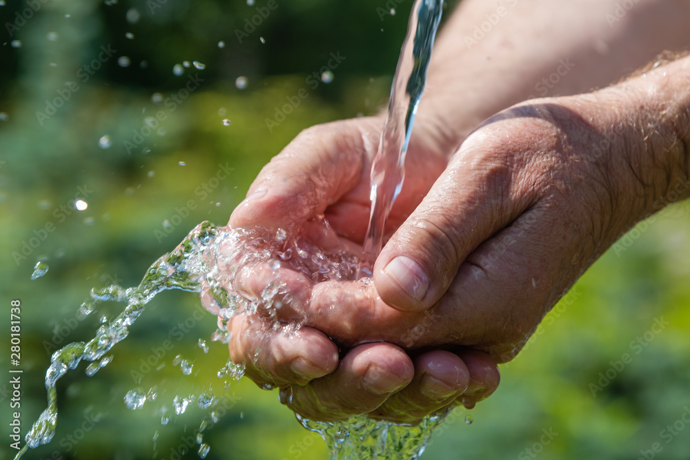 Fototapeta premium Hand washing in running water.