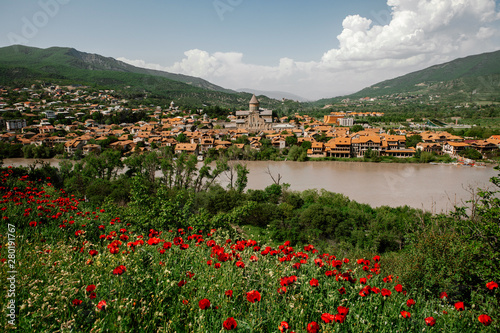 View of Mcheta, Georgia. Red poppies in the foreground
