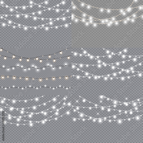 Set of christmas lights isolated realistic design elements. Glowing lights for Xmas Holiday cards, banners, posters, web design. Garlands decorations. Vector illustration.