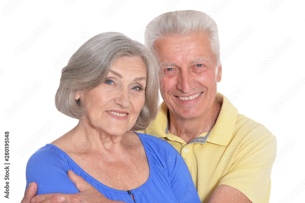 happy beautiful senior couple huging and posing on white background happy beautiful senior couple huging and posing on white background