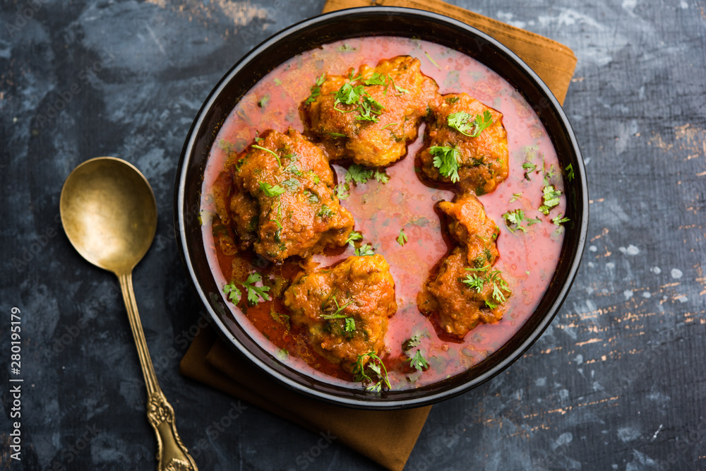 Lauki Kofta Curry made using Bottel Gourd or Doodhi, served in a bowl or karahi. selective focus Lauki Kofta Curry made using Bottel Gourd or Doodhi, served in a bowl or karahi. selective focus