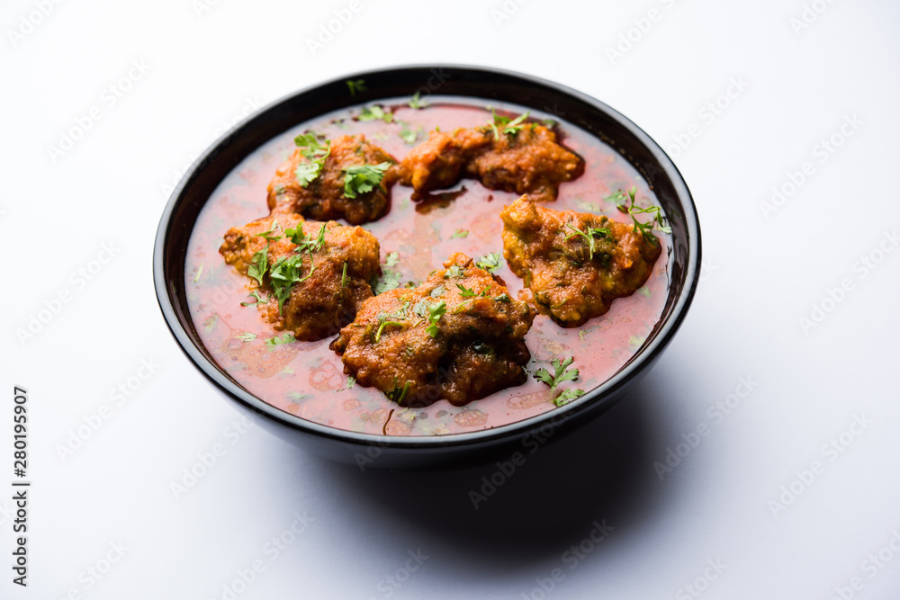 Lauki Kofta Curry made using Bottel Gourd or Doodhi, served in a bowl or karahi. selective focus Lauki Kofta Curry made using Bottel Gourd or Doodhi, served in a bowl or karahi. selective focus