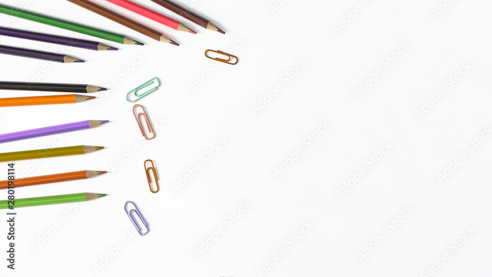 Multicolored pencils and clips Multicolored pencils and clips