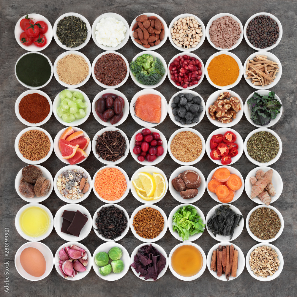 Large health food selection to slow the ageing process including fish, fruit, vegetables, seeds, nuts, herbs, spices, supplement powders, honey, dairy, pollen grain, green teas, and dark chocolate. Large health food selection to slow the ageing process including fish, fruit, vegetables, seeds, nuts, herbs, spices, supplement powders, honey, dairy, pollen grain, green teas, and dark chocolate.