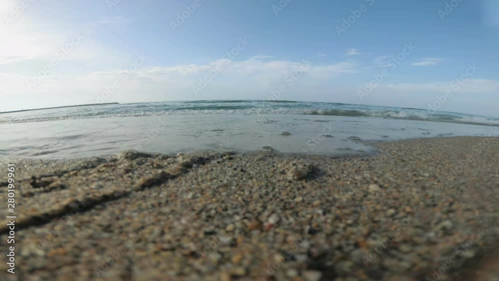 Sea, tide and calm sea wave. Sandy beach without people, video action camera. Sea, tide and calm sea wave. Sandy beach without people, video action camera.