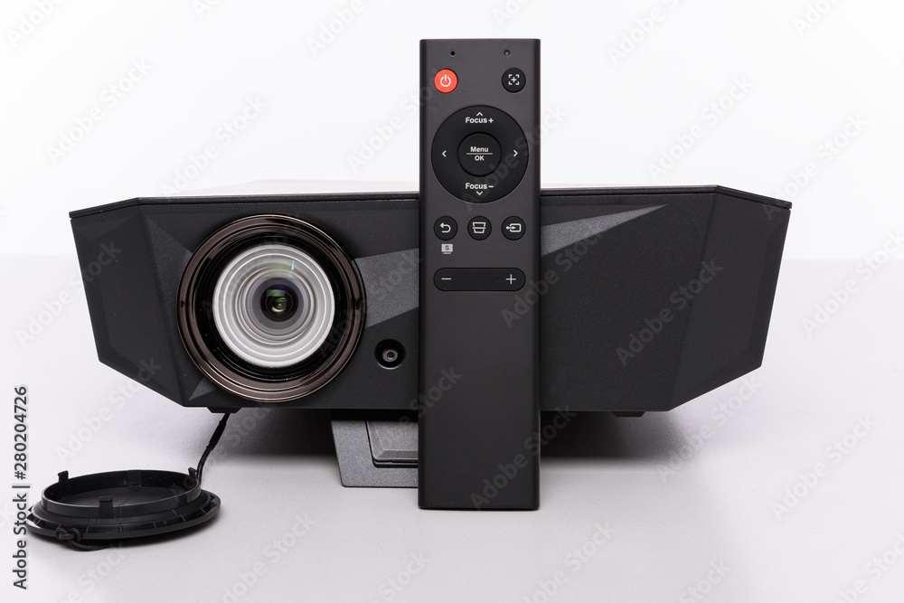 Obraz premium Stylish modern mini LED projektor with remote