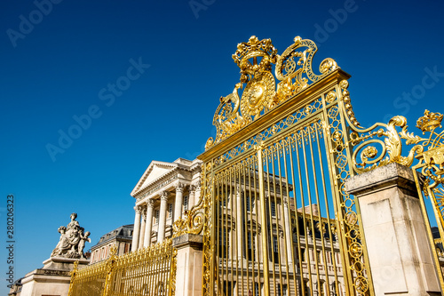 The golden gate of the Palace of Versailles in France