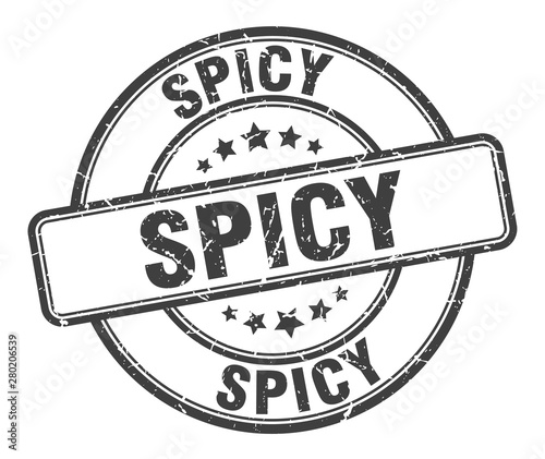 spicy stamp. spicy round grunge sign. spicy