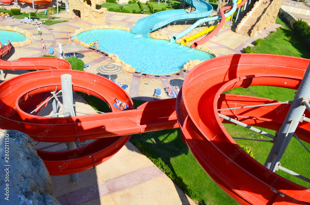 Descent on the water slide in aqua park. View from above