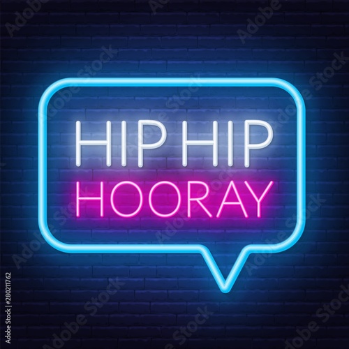 Neon sign hip hip hooray in frame on dark background.