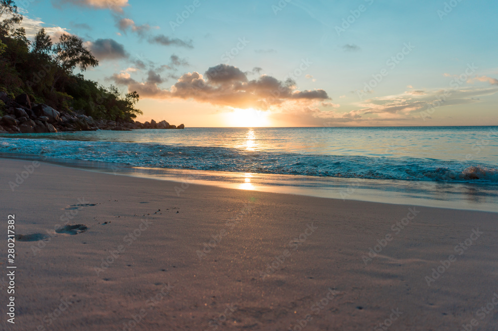 Sunset at a sandy beach in Seychelles