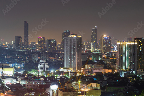 Cityscape of building at night. © tisomboon