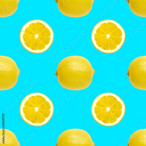 Wallpaper Mural Lemon Seamless photo pattern Halves and whole fresh lemons on a bright blue background Torontodigital.ca