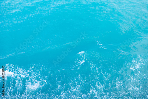 Fototapeta Naklejka Na Ścianę i Meble -  Sea  Waves in ocean wave Splashing Ripple Water. Blue water background. Leave space for writing text. 