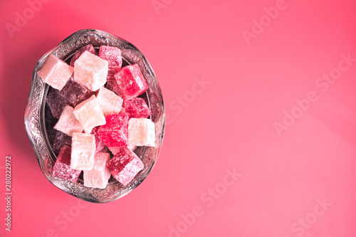Φωτογραφία Turkish delight. Flavoured Turkish delights on isolated surface