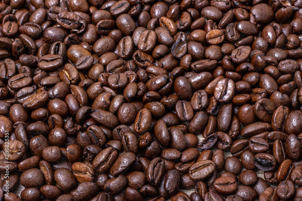 Background of roasted, fragrant coffee beans. Background of roasted, fragrant coffee beans.
