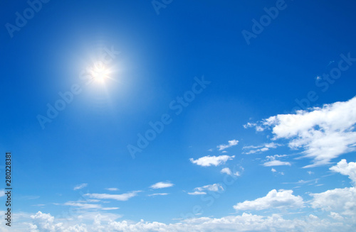 blue sky background with tiny clouds