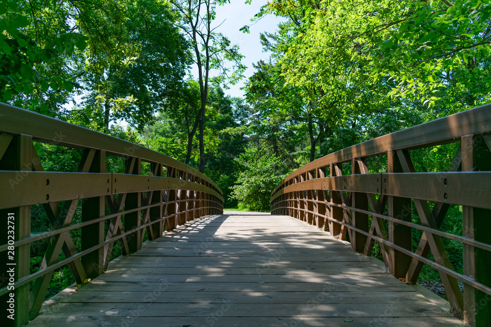 Simple Bridge over the DuPage River along the Naperville Riverwalk in Naperville during Summer