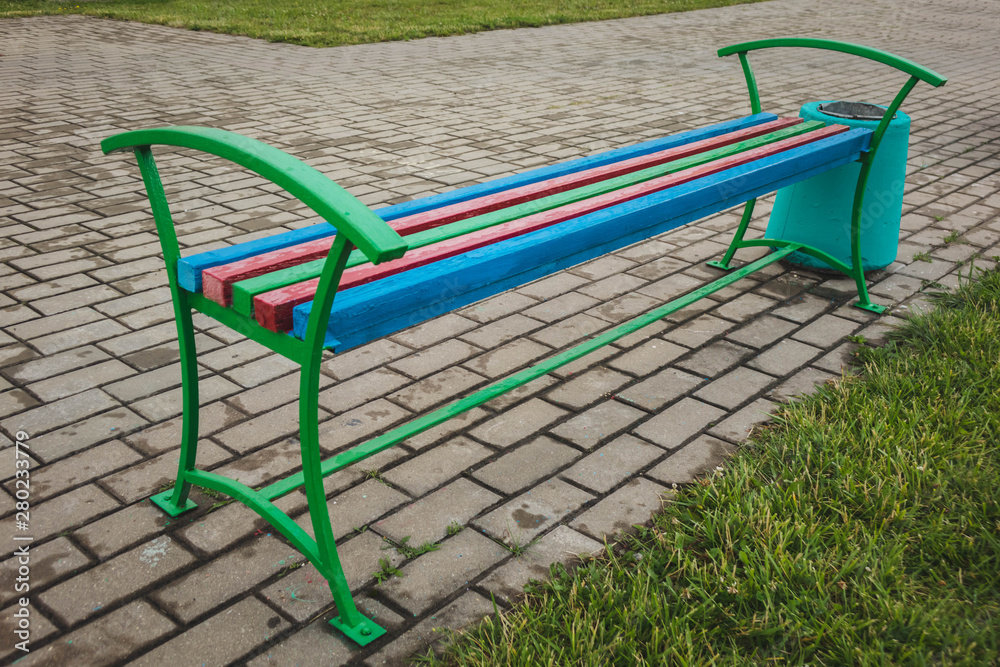 closeup of colorful wood bench in the street. closeup of colorful wood bench in the street.