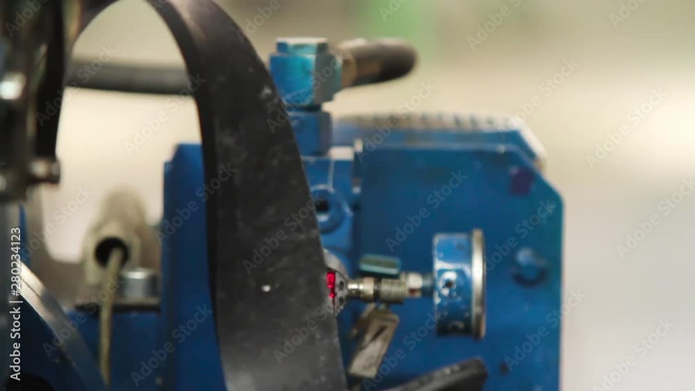 Recycling and waste of the chemical industry. Refinery waste. Full cycle production of car tires. Tire production machine close up. Manufacture of tires. Recycling rubber in a large enterprise.