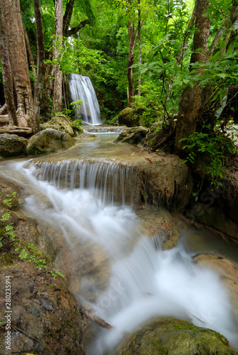 Beautiful waterfall in green forest shoot by slow shutter speed to make the water look softer, Erawan Waterfall, Kanchanaburi Province in Thailand