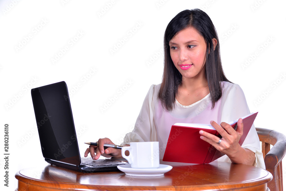 Young pretty business woman with notebook isolated on white background Young pretty business woman with notebook isolated on white background