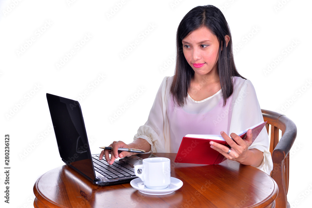 Young pretty business woman with notebook isolated on white background Young pretty business woman with notebook isolated on white background
